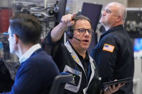 Stock market sinks as AI and interest rate worries grip investors